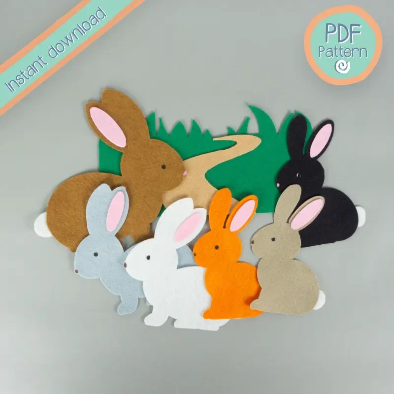 Five small felt bunnies along with a larger one, plus grass and a trail, with the words Instand Download and PDF Pattern overlayed.