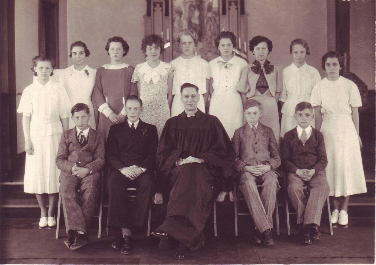 1936 1st row: Albert John, Jack Strain, Rev. Pinkall, Clarence Young, Maxwell Krumwiede 2nd row: Beverly Mosher, Gladys Allaway, Lorraine Weigand, Maxine Krumwiede, Phyllis Metz, Betty Lou Mitchell, Doris Molstad, Muriel Miller, Marcella Rasmussen