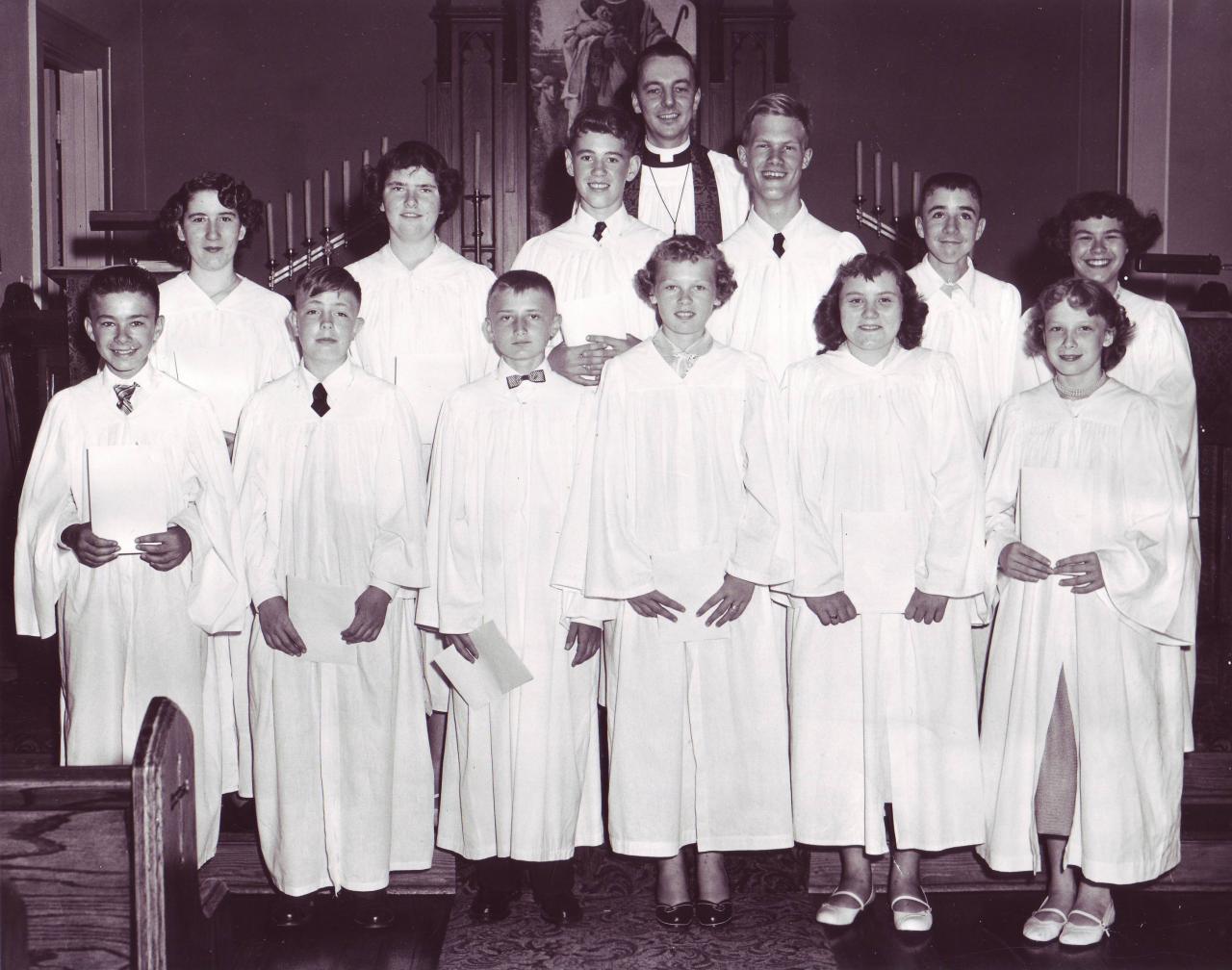 1954 1st row: Jerry Leamer, Walter Hansen, Ronald Wilson, Jeannine Surber, Shirley Kroeger, Nyla Loseke 2nd row: Darlene Westfall, Carol Rasmussen, Philip Garner, Jan Johansen, Raymond Schmidt, Sharon DeMars, Pastor Jensen