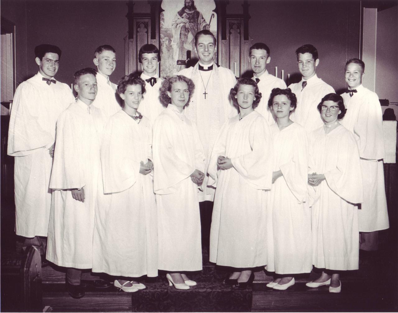 1955 1st row: Donald Stading, Pamela Hirschbach, Lillian Nelson, Jacquelyn Surber, Sandra Harris, Nellie May Schmidt 2nd row: Michael McArthur, Kenneth Stading, Carolyn Helt, Pastor Jensen, Rodney Tompkins, James Severson, Clark Kleinberg