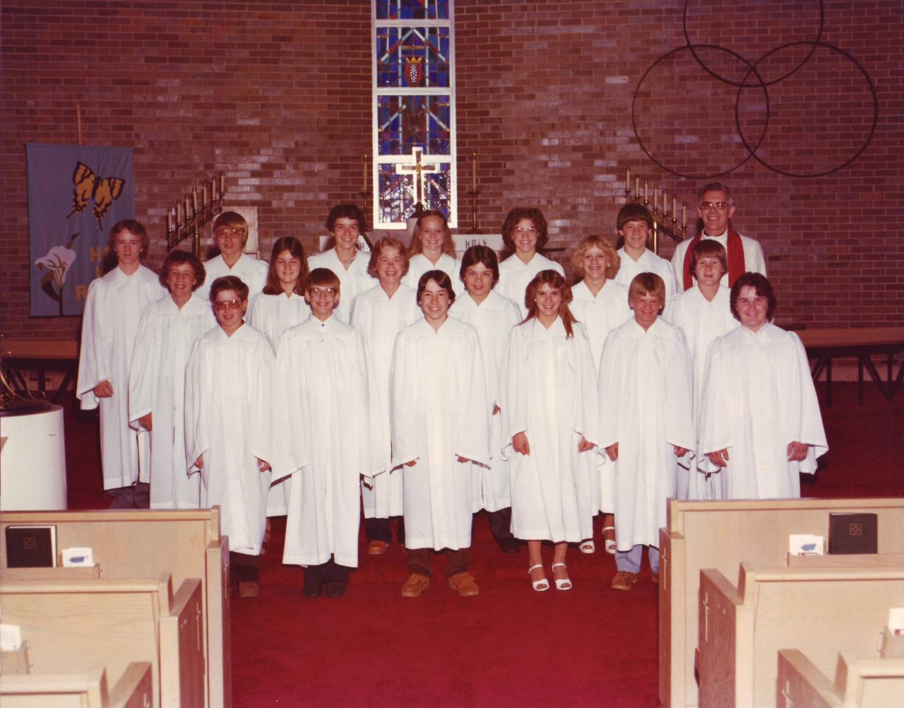 1981 1st row: Rodney Krogh, Alan Schnoor, Brad Simons, Marsha Brown, Brad Kjose, Lee Bottger 2nd row: Mike Kollbaum, Jill Blessing, Doug Grove, Tracy Dillard, Joan Oberg, Jon Johansen 3rd row: Todd Bottger, Tom DeRoos, Matt Krumwiede, Kori Ewoldt, Susanne Blessing, Kevin Weyhrich, Pastor Karl Konig