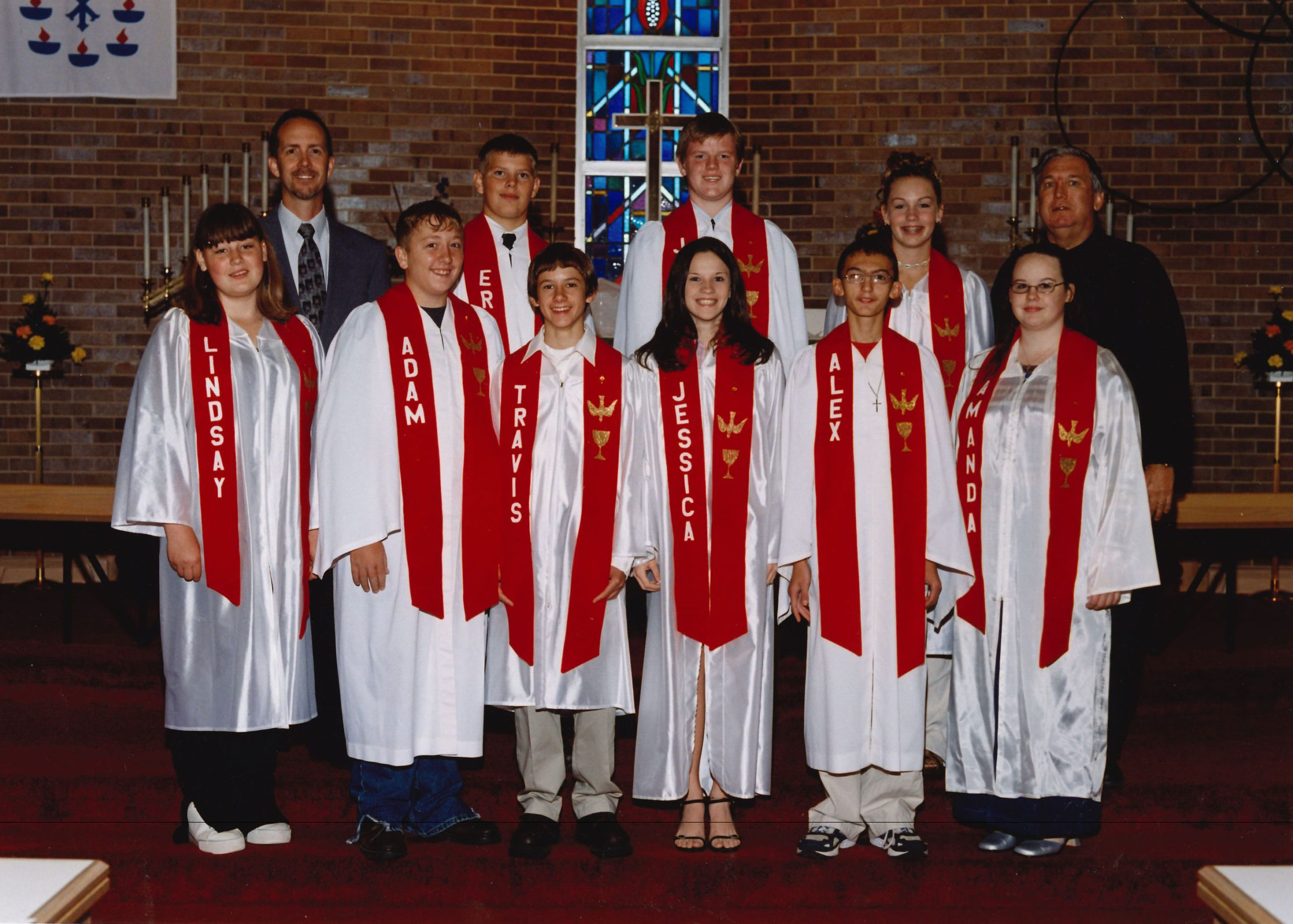 2003 1st row: Lindsay Johnson, Adam Lake, Travis Jones, Jessica Helt, Alex Steele-Olache, Amanda Bottger 2nd row: Burt Heithold, Eric Barber, James Santee, Kayla Koenig, Pastor Dale Jirousek ©Bobier Studio