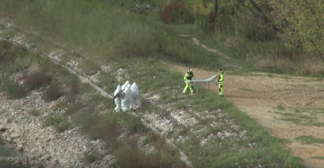 Men Wearing Hazmat Suits, Pull Merman From The Waters Of Poland