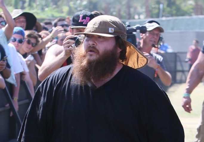 Action Bronson was handcuffed after lighting up on stage in Kosovo.