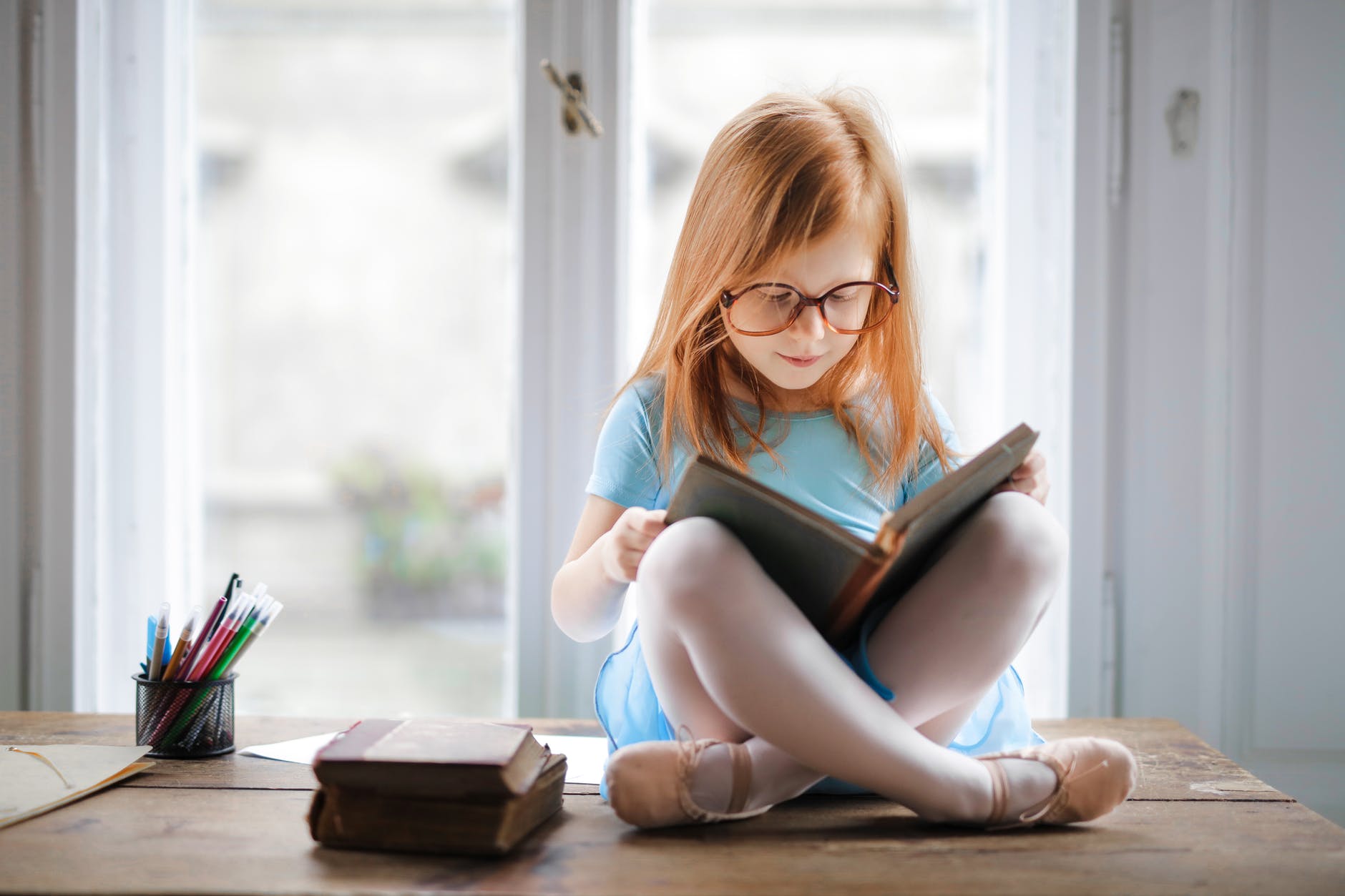 Struggling to Get Your Child Reading? New 11 Plus Reading Club for Children in Year 4, 5 and 6! Joycellyn Akuffo photo of girl reading book