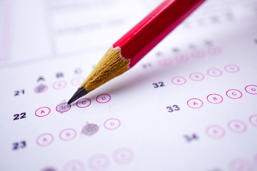 Expert 11 Plus Tutoring in Beckenham: Unlock Your Child's Potential Joycellyn Akuffo Answer sheets with Pencil drawing fill to select choice : education concept