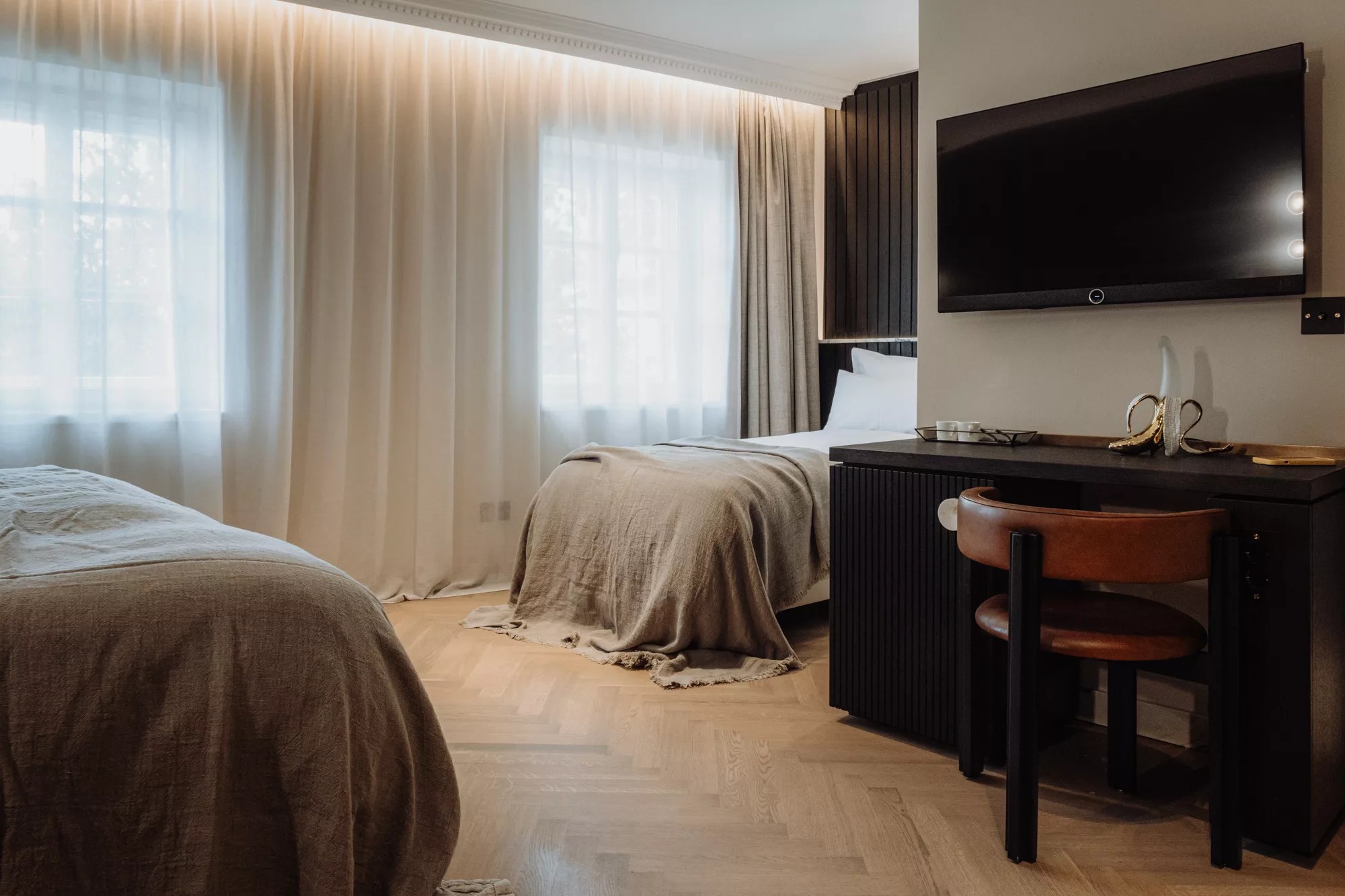 Experience comfort and relaxation in the family room at Gentle Hide, designed to provide a serene and inviting atmosphere for guests.