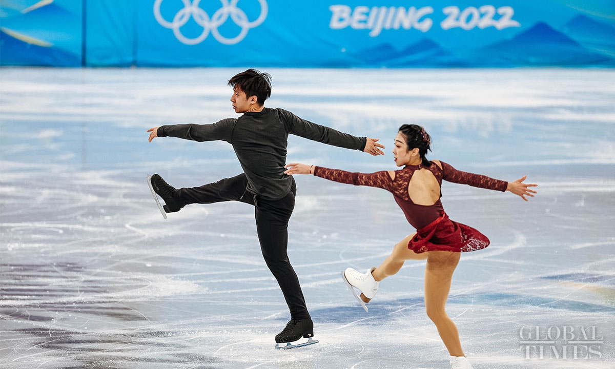 Chinese winter olympics figure skaters practice at beijing capital