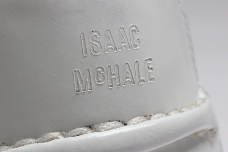 close up of logo design by Isaac McHale