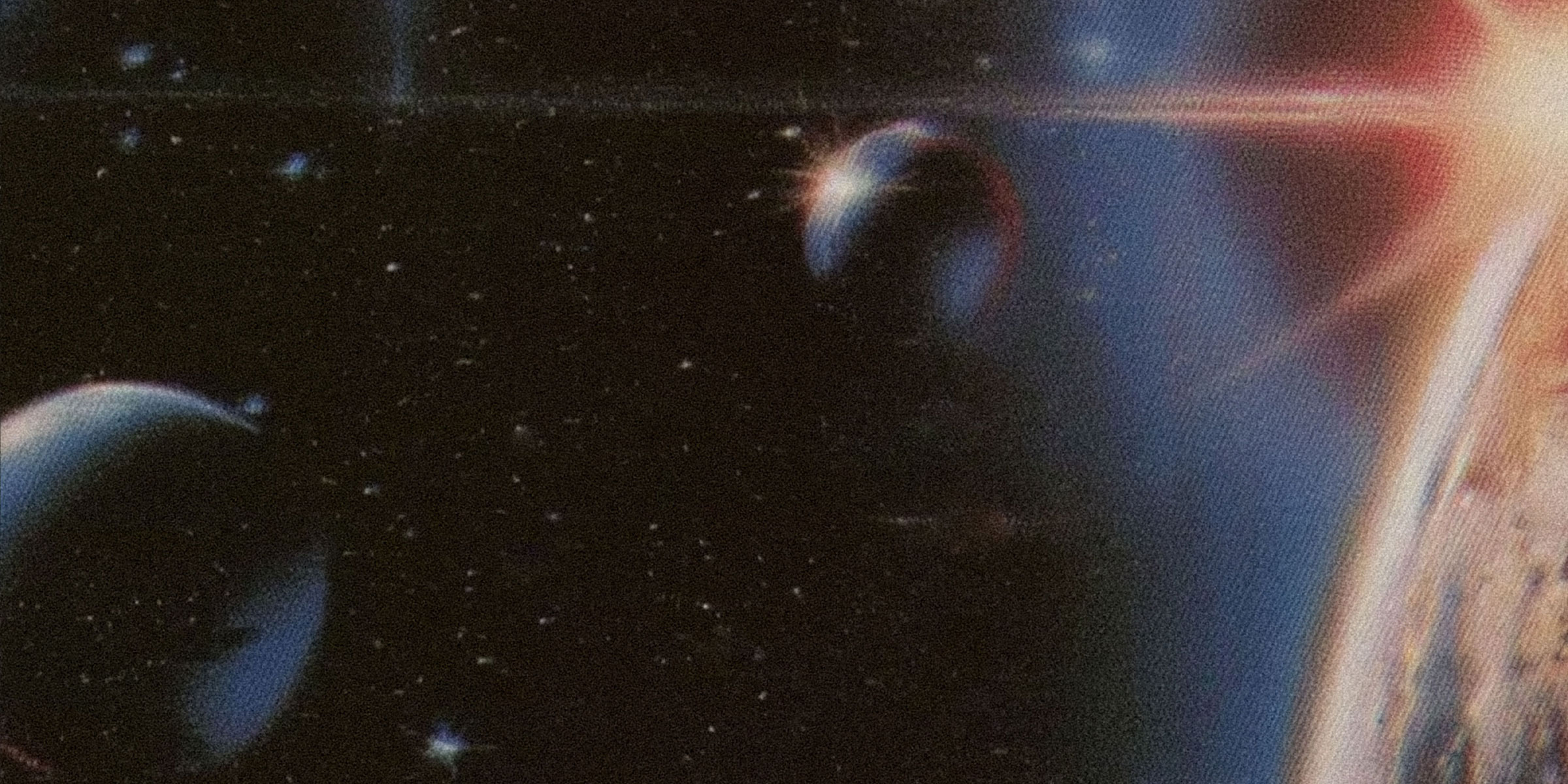 A space scene with the sun rising over earth beside stars and planets.