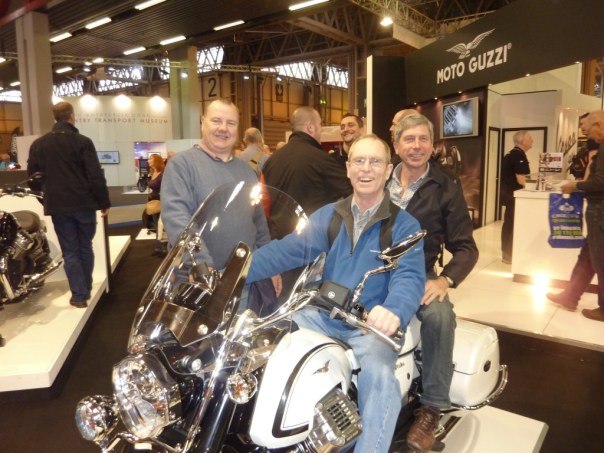 Bob Hill, association chair in the chair, John Blanchfield is right behind the chair and Andy Pratt attends the chair.