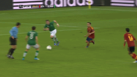 Ireland player Keith Andrews is knocked over by the referee at Euro 2012.