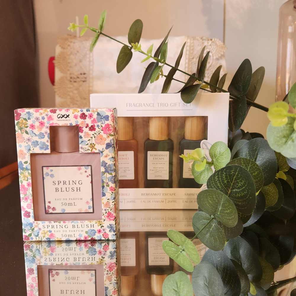 Close-up of Kmart dupe fragrances, featuring elegant bottles of affordable perfumes that rival high-end brands.
