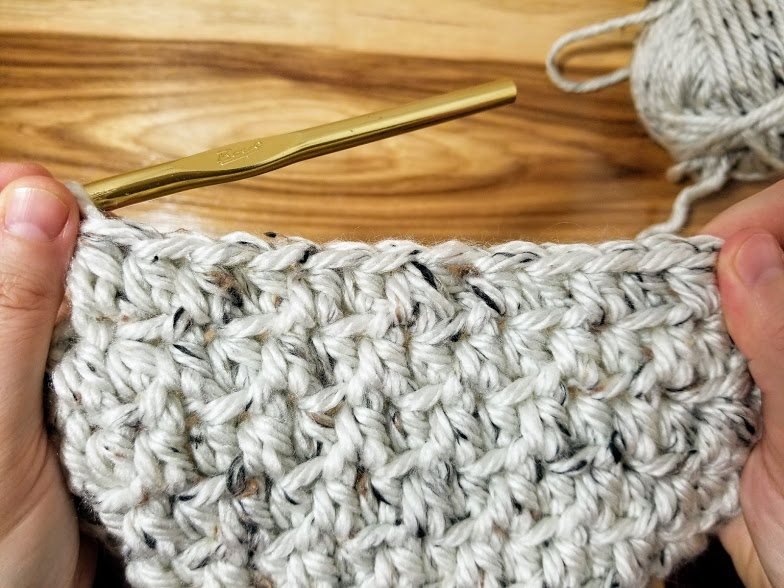This is the special stitch necessary for the Aspen Tweed Hat crochet pattern. It is a photo tutorial. This stitch utilizes the front and back loops rather than working with both loops.