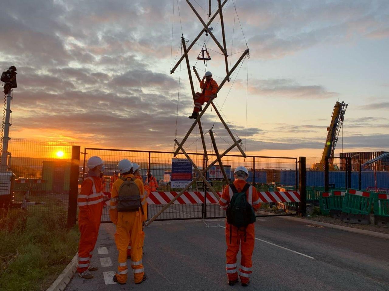 Read more about the article HS2 Rebellion activists in court charged with ‘hiding tools’ – despite being physically locked-on, on the opposite side of a compound gate