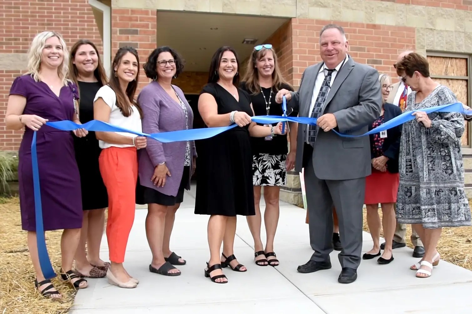 Ribbon cutting group