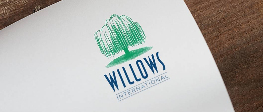 letter head showing a willow tree and blue writing