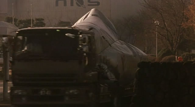 A young woman from the future forces a local gunman to help her stop an impending alien invasion which will wipe out the human race. Imcdb Org 1995 Isuzu Giga In Ritana 2002