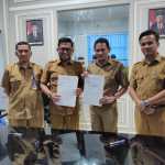 Penandatangan MoU antara Kepala Sekretariat BMA Rahmad Raden dan Kepala DPMG Aceh Zulkifli di Kantor BMA, Senin (19/9)
