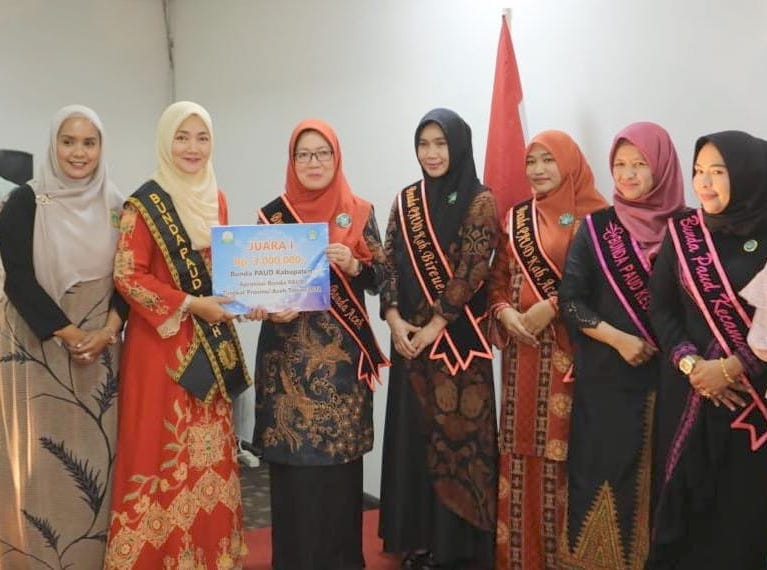 Pj Bunda PAUD Kota Banda Aceh Sri Dewi Kurnilawati meraih juara pertama dalam ajang Apresiasi Bunda PAUD Kabupaten tingkat Provinsi Aceh Tahun 2022
