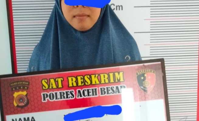 Polisi tahan Ibu Rumah Tangga sebagai terduga pelaku penipuan 57 warga Aceh Besar dengan modus dapat rumah bantuan