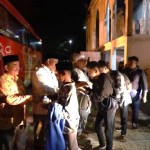 Pj Bupati Aceh Besar Muhammad Iswanto diwakili Asisten Perekonomian dan Pembangunan Sekdakab Aceh Besar M Ali melepas keberangkatan qari-qariah Aceh Besar juara MTQ menuju ke Tanah Suci untuk melaksanakan umrah, Senin malam (13/3)