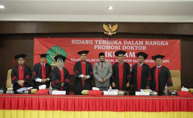 Tgk H Ikhram M Amin MPd, Kepala KUA Kecamatan Ingin Jaya Aceh Besar berhasil mempertahankan Disertasinya pada sidang terbuka yang berlangsung di Pascasarjana UIN Ar-Raniry, Sabtu (12/8)