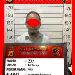 Tersangka ZU diamankan di Polres Aceh Timur terkait kasus penganiayaan terhadap istrinya. (Foto: Dok. Polres Aceh Timur)