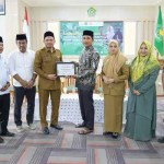 Kadisdik Dayah Aceh Dr Munawar A Djalil pada Lokakarya Diseminasi Pembelajaran dan Praktik Baik Program Dayah Ramah Anak Terintegrasi (Pro-DAI) di Aula Kanwil Kemenag Aceh, Senin (24/6). Foto: Istimewa