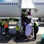 Jamaah Haji Aceh Kloter 10 tiba di Bandara SIM, Blang Bintang, Aceh Besar, Sabtu (20/7). Foto: Istimewa