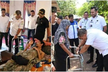 Pj Bupati Aceh Besar Muhammad Iswanto menyerahkan bantuan tongkat empat kaki kepada Yusri Affan dan ibu Radhian warga di Gampong Lam Me, Kecamatan Blang Bintang, Rabu (3/7/2024). Foto: Istimewa