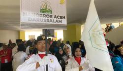 Kontingen Porwanas PWI Aceh saat tampil pada defile kontingen pembukaan Porwanas XIV di GOR Paman Birin, Banjarbaru, Kalsel, Kamis, 22 Agustus 2024. (Foto: Dok. PWI Aceh)