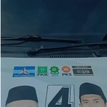 Mobil Timses Calon Bupati Pidie Zakaria A Gani - Imran Abubakar ditembak saat terparkir di rumahnya di Gampong Dayah Pisang, Kecamatan Glumpang Tiga, Pidie, pada Kamis (14/11). (Foto: For Infoaceh.net)