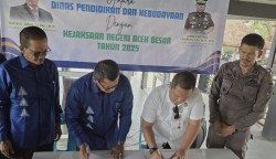 Kejari Aceh Besar dan Disdikbud Aceh Besar menandatangani nota kesepakatan untuk melanjutkan program jaksa masuk sekolah, Kamis (15/5)