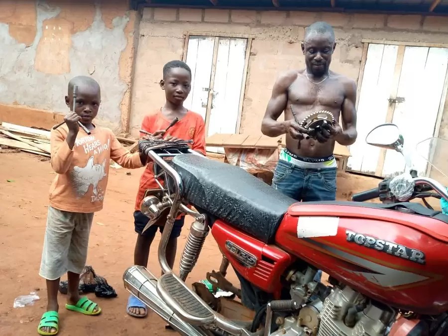 Father Explains Why He Teaches His Kids How To Repair Motorcycles