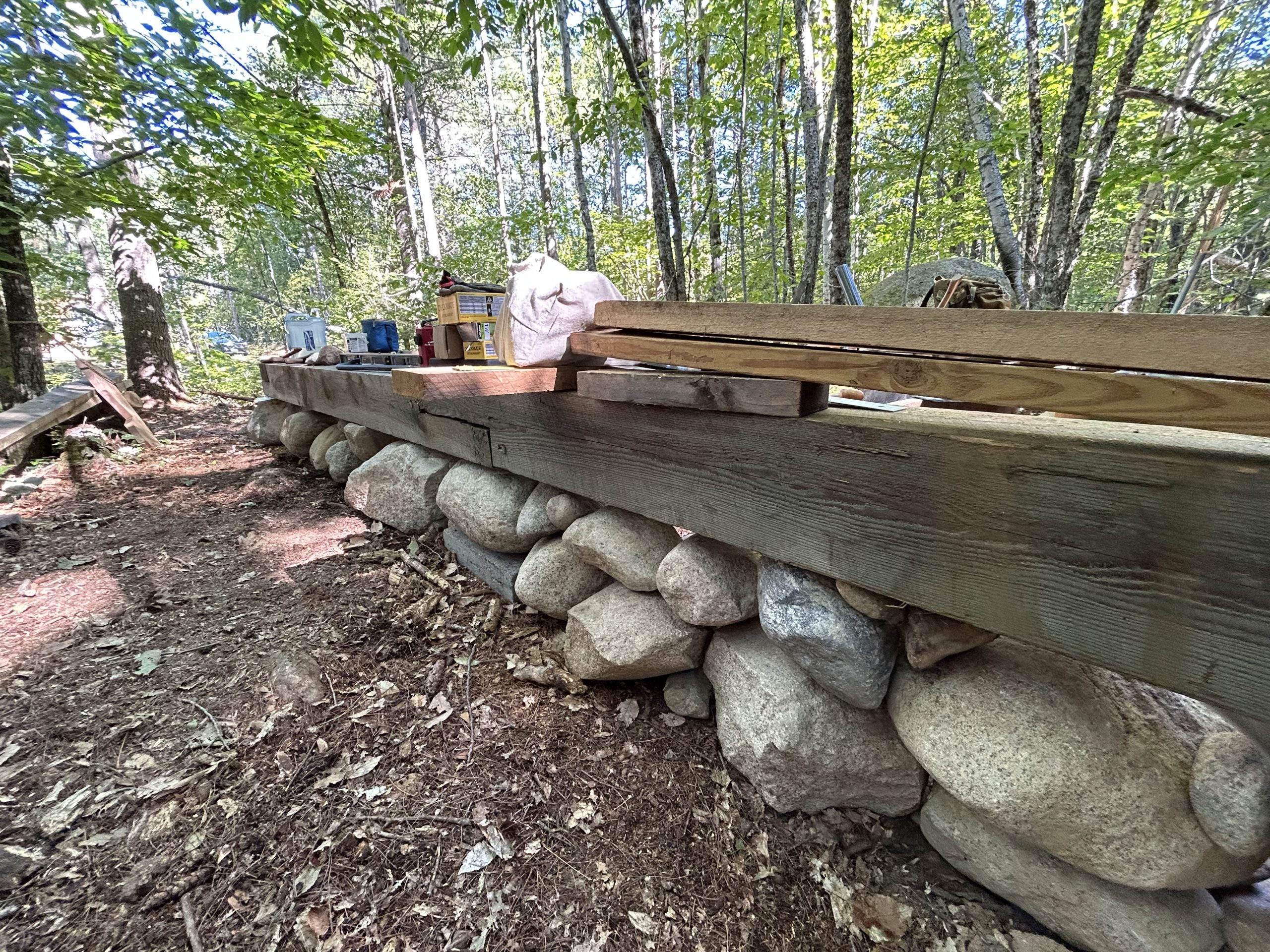 Foundation stones. Thoreau replica cabin. ©2026 JeffRyanAuthor.com