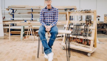 Entrepreneur analyzing ecommerce KPIs and sales performance on a Jimdo dashboard — tracking online store growth.