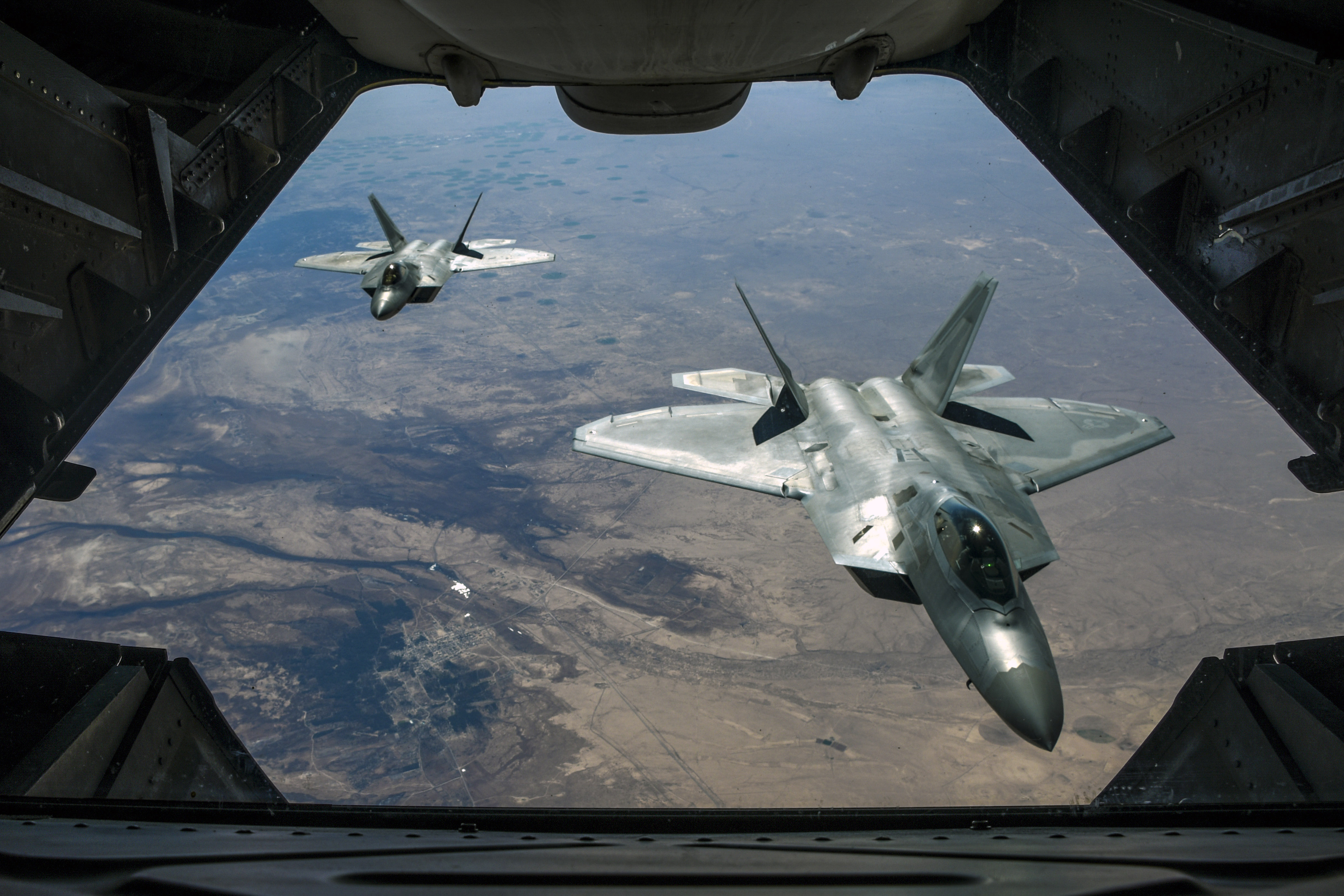 Two U.S. Air Force F-22 Raptors fly above Syria in support of Operation Inherent Resolve, Feb. 2, 2018.