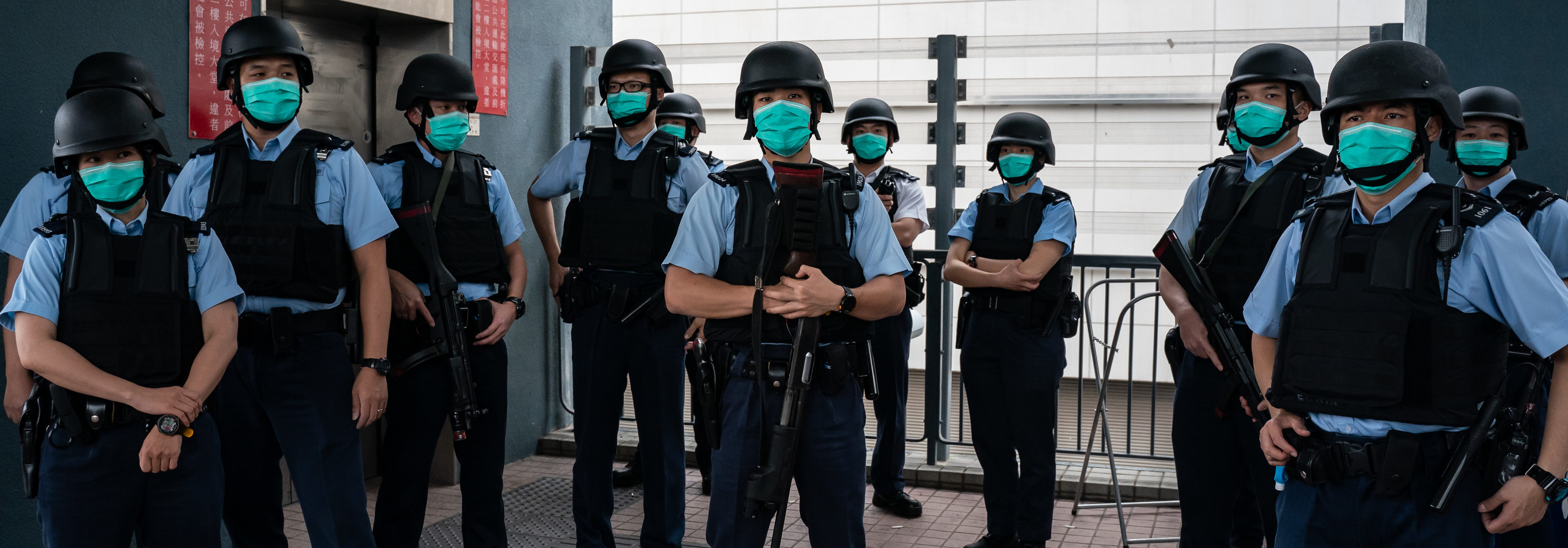 Police officers standby during an inter-departmental counter-terrorism exercise, codenamed CATCHMOUNT at Lok Ma Chau Spur Line Control Point in Hong Kong on March 20, 2020 in Hong Kong, China.