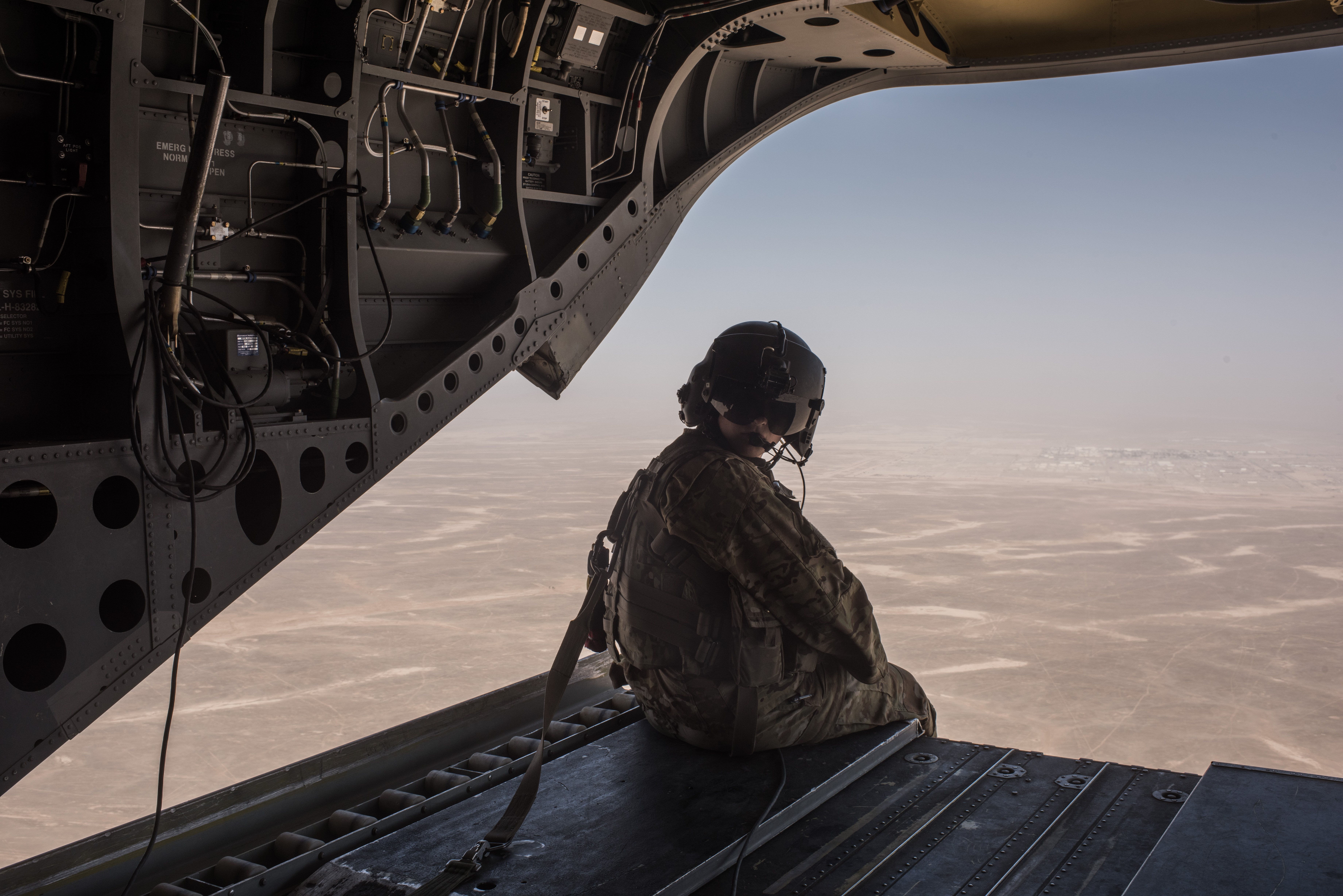A U.S. Army helicopter flies outside of Camp Shorab on a flight to Camp Post on September 11, 2017 in Helmand Province, Afghanistan.