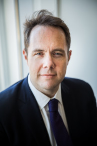 <span class="vcard">John Gans</span>