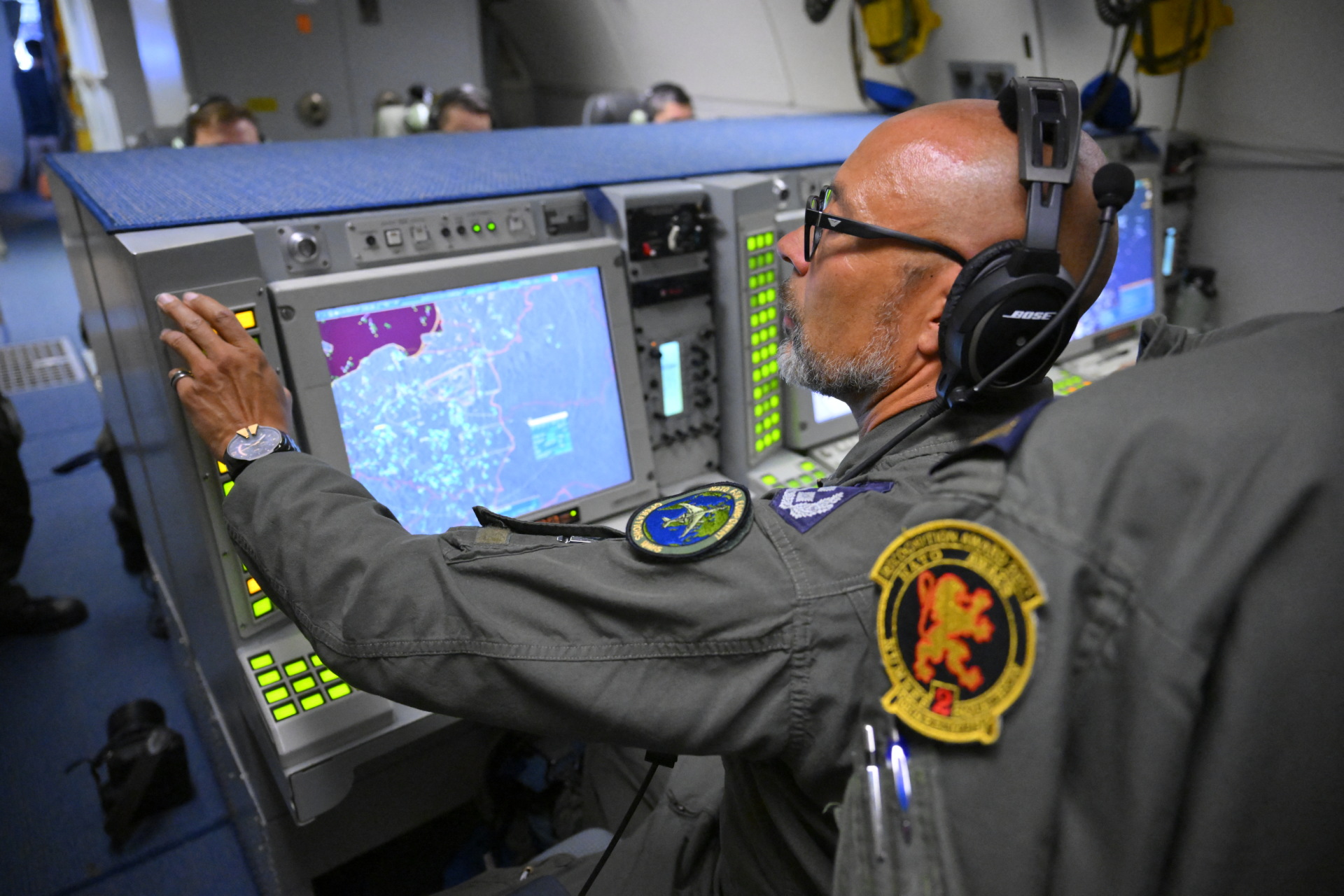 A NATO AWACS Tactical Director assesses the air and surface situation aboard an AWACS (Airborne Warning and Control System) NATO air surveillance aircraft during a flight over Polish airspace as part of the alliance's new Eastern Sentry mission on September 19, 2025. NATO said on September 19, 2025, it had scrambled aircraft to intercept Russian jets violating Estonian airspace, calling it proof of Moscow's "reckless" behaviour and the alliance's readiness to counter it. (Photo by JOHN THYS / AFP) (Photo by JOHN THYS/AFP via Getty Images)