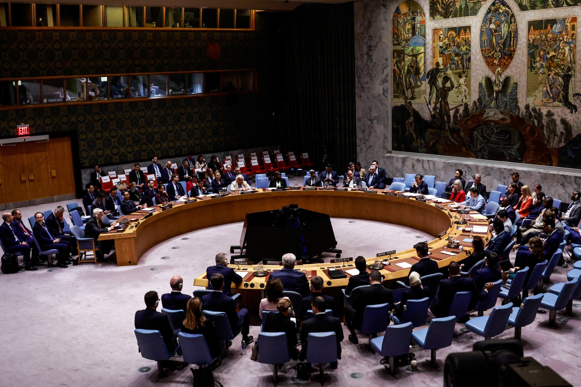 First Deputy Permanent Representative of Russia to the UN Dmitry Polyansky (R) speaks at a Security Council meeting on Ukraine at the United Nations in New York on September 23, 2025. (Photo by Kena Betancur / AFP) (Photo by KENA BETANCUR/AFP via Getty Images)