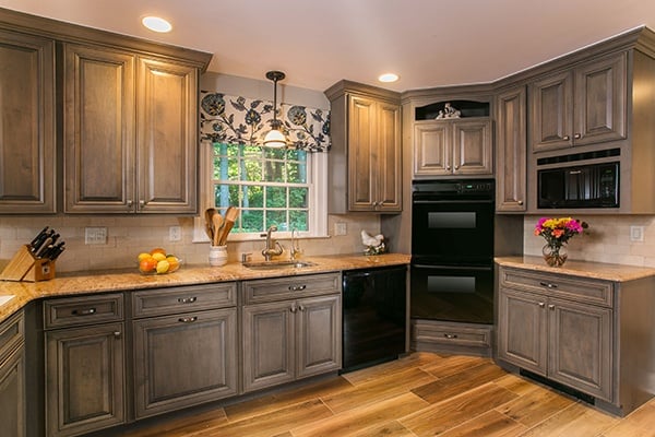 This traditional kitchen in greenwich, ct, invites guests and family members to gather in its warm glow. The Difference Between Cabinet Grade Furniture Grade Wood Cabinets