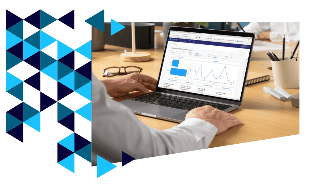 Insurance Professional working on an Applied Epic Dashboard