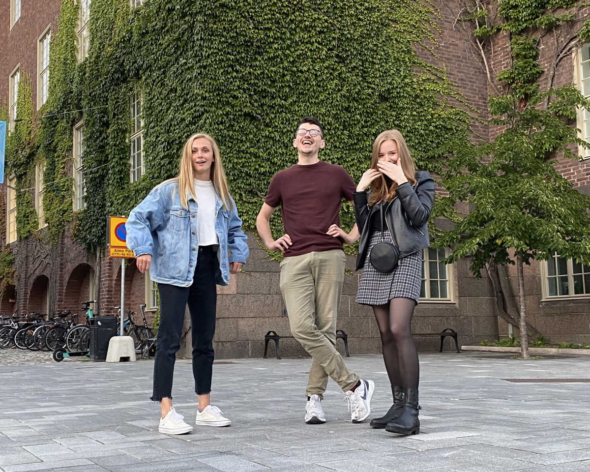 Claire, Declan, and Valerie goofing around outside KTH Entre.