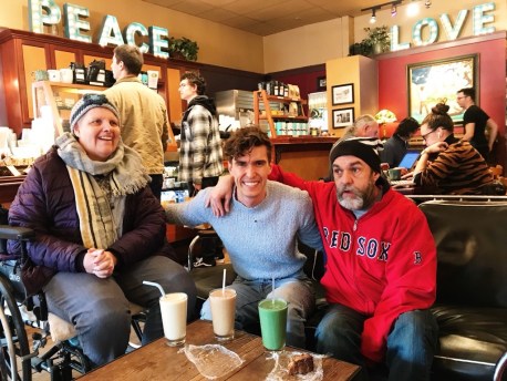 Joni, Parker, and Adam enjoy smoothies at a cafe
