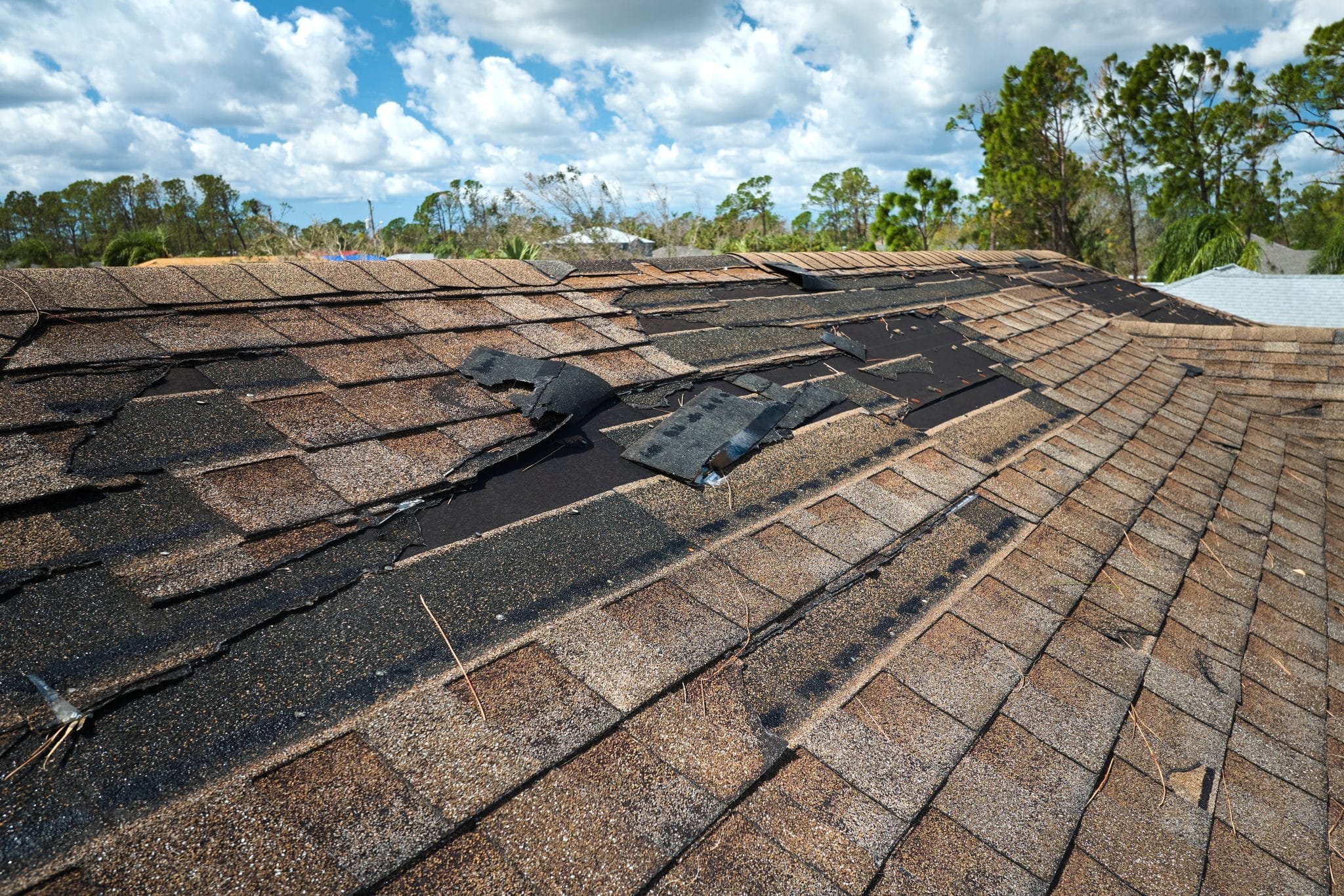 Damage Roofed with missing shingles 24 hour emegency roof repair LC-Contracting