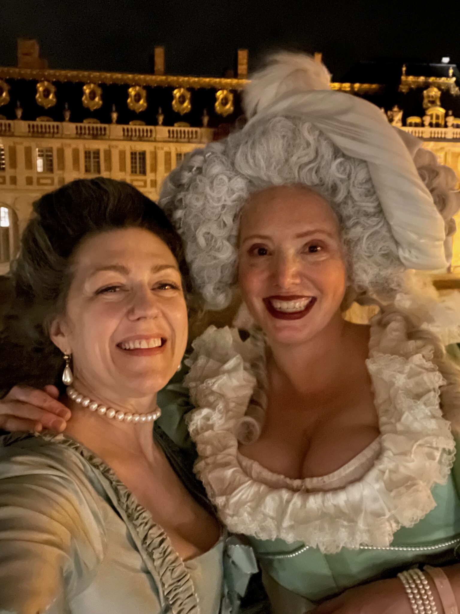two women in historical costumes