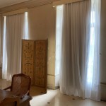 tall windows with curtains